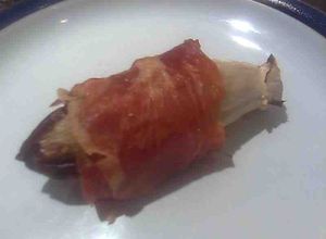 Una foto de Endivia envuelta en jamón crujiente