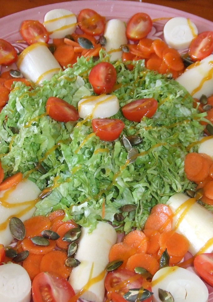Una foto de Ensalada de palmitos con salsa de mango