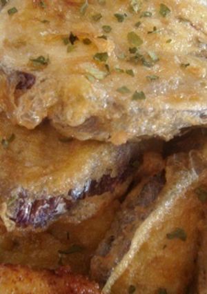 Una foto de Berenjenas rebozadas y fritas