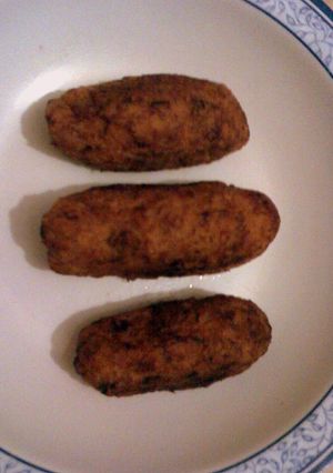 Una foto de Plátanos fritos rellenos de queso crema