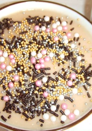 Una foto de Postre de nísperos y piña