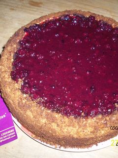 Una foto de Cheesecake con salsa de Zarzamora