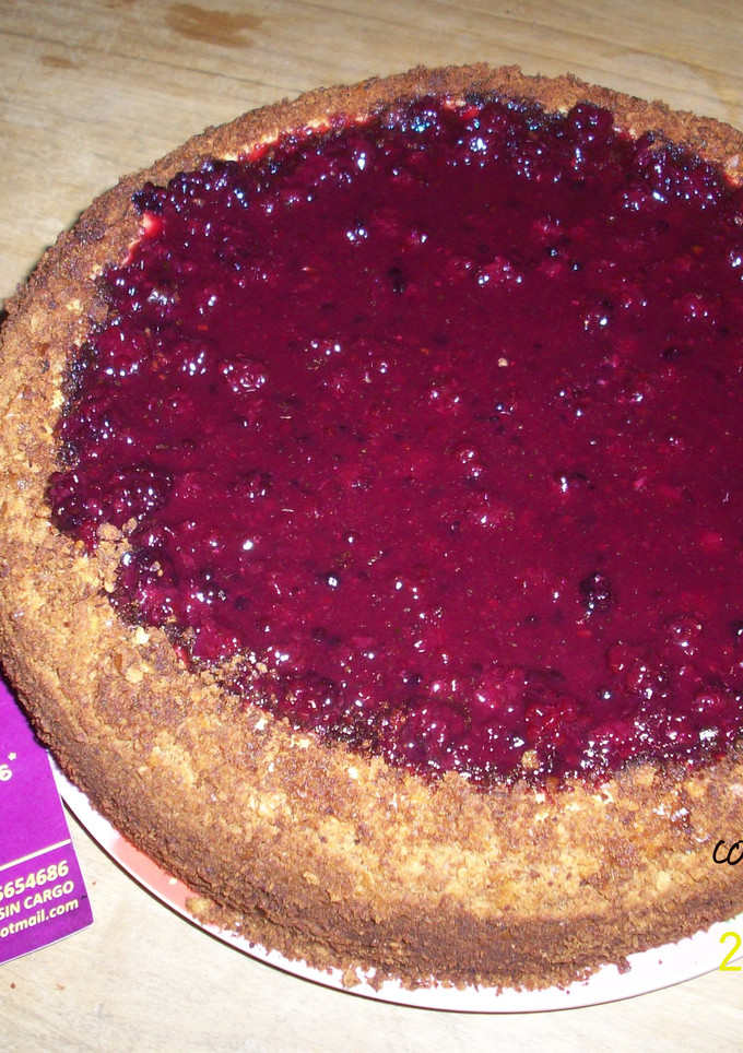 Una foto de Cheesecake con salsa de Zarzamora