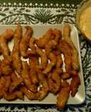 Rabas de pollo y coco con vinagreta de yogur