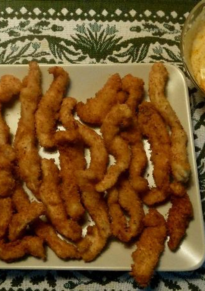 Una foto de Rabas de pollo y coco con vinagreta de yogur