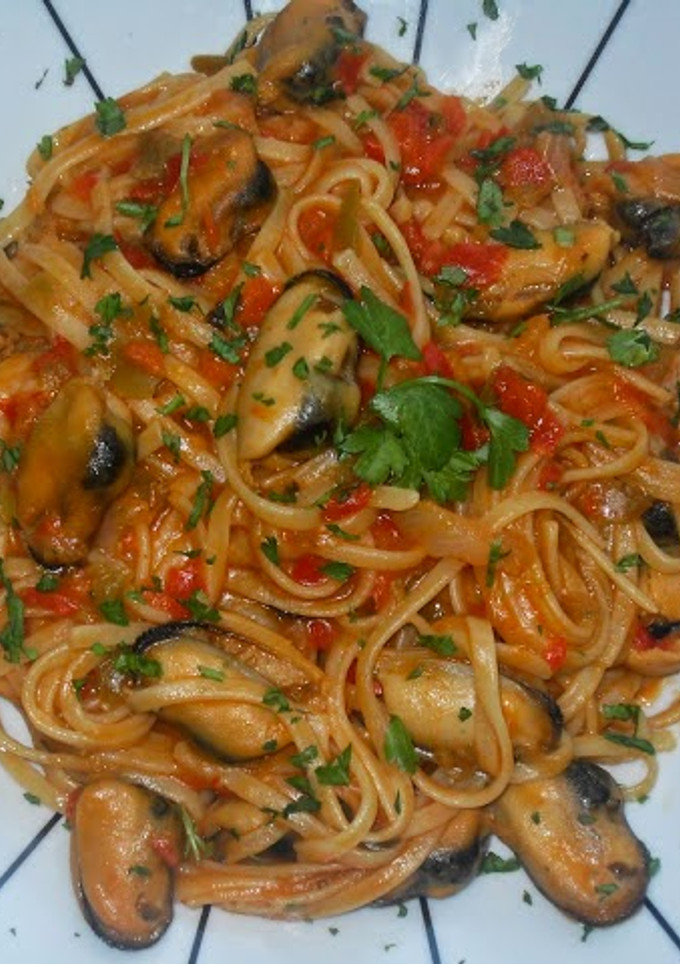 Una foto de Pasta con mejillones