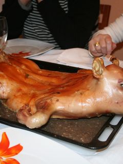Una foto de Lechón al horno al estilo de Maggitta