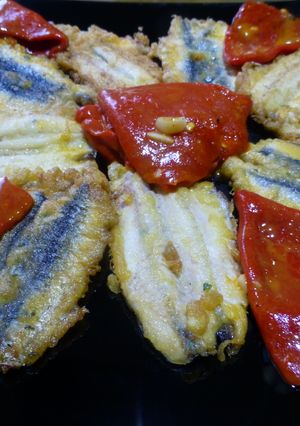 Una foto de Anchoas frescas rebozadas con pimientos
