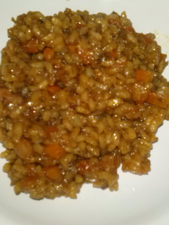 Una foto de Risotto con gambas, cebolla, pimiento y zanahoria