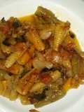Caracolas con sofrito y queso