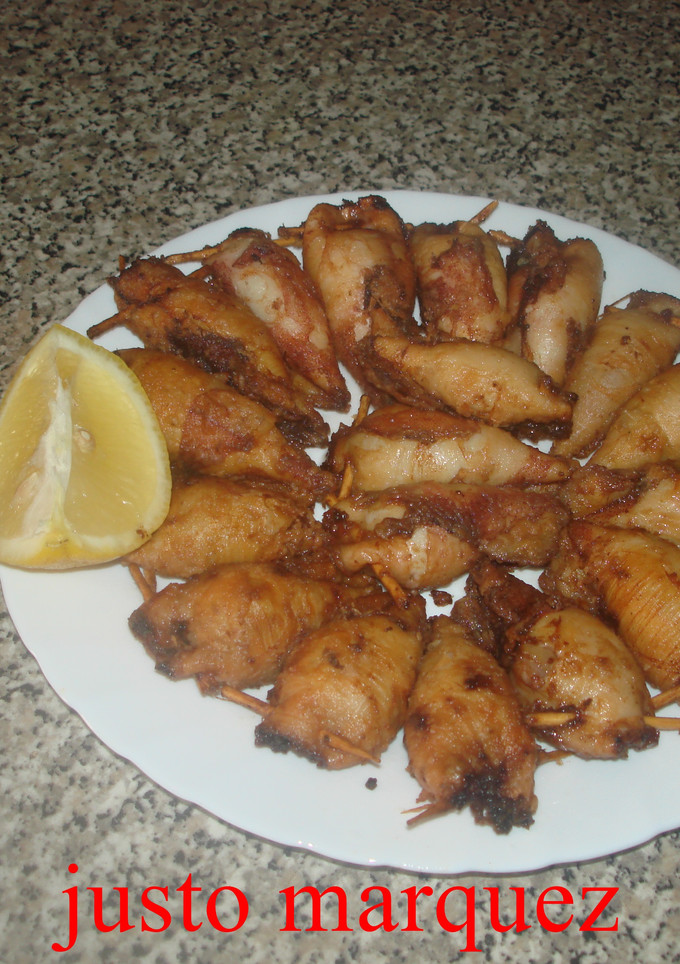 Una foto de Calamares rellenos con picadillo
