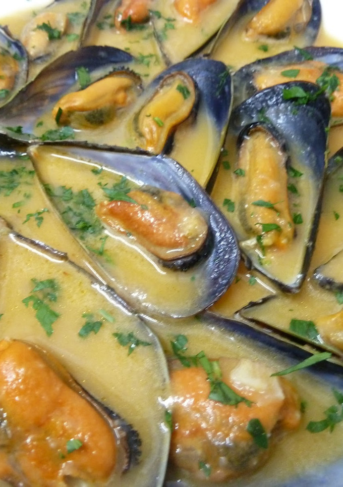 Una foto de Mejillones al cava