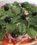 Pizza con espinacas frescas