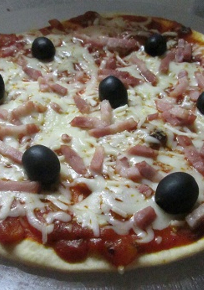 Una foto de Pizza con beicon