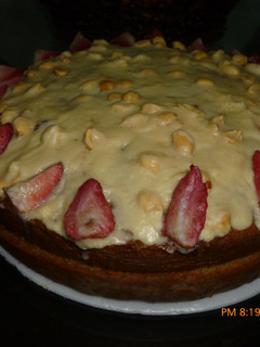Una foto de Torta de café y fresas