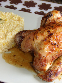 Una foto de Picantones asado con naranja y arroz al aroma de azafrán
