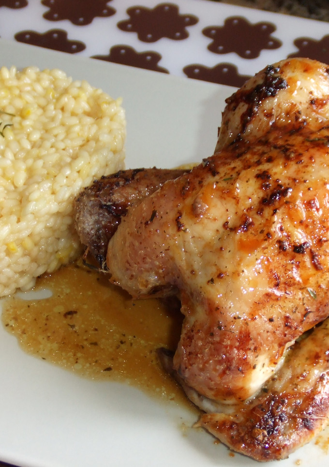 Una foto de Picantones asado con naranja y arroz al aroma de azafrán