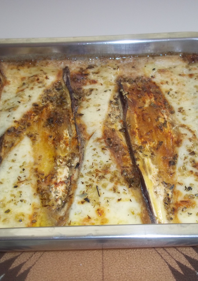 Una foto de Tarta de berenjenas, beicon, york y queso