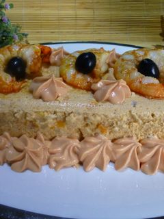 Una foto de Budín de langostinos y lomos de cabracho