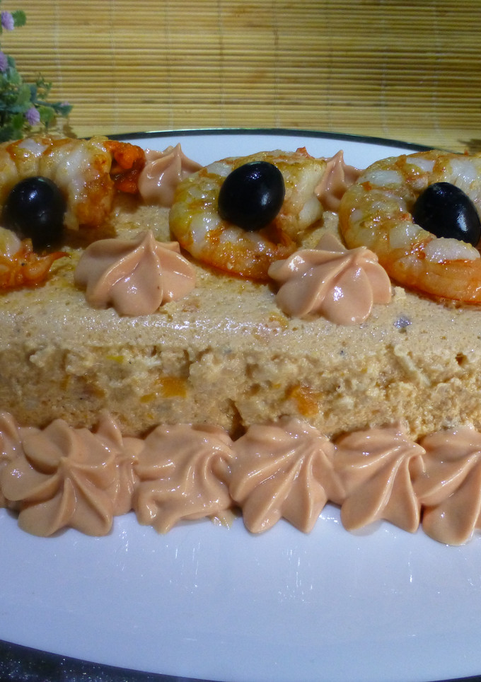Una foto de Budín de langostinos y lomos de cabracho