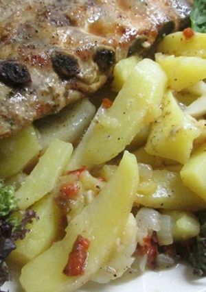 Una foto de Costillar de cerdo al horno con patatas blandas