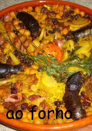 Una foto de Arroz al horno (arros al forn)