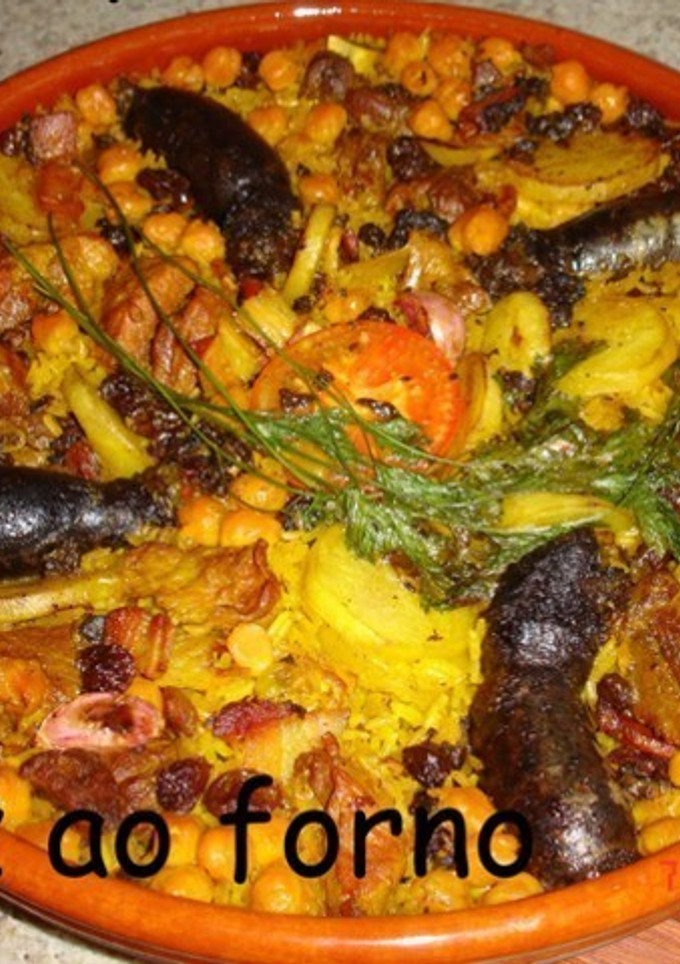 Una foto de Arroz al horno (arros al forn)