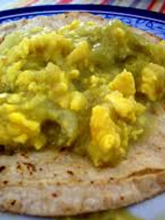 Una foto de Huevo en salsa verde