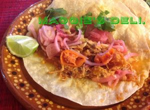 Una foto de Pollo en achiote
