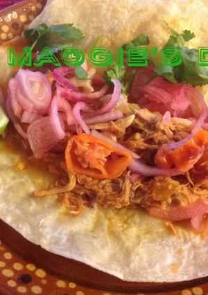 Una foto de Pollo en achiote