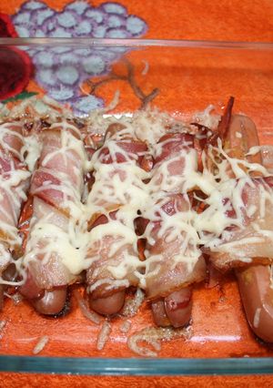Una foto de Salchichas con tiras de beicon