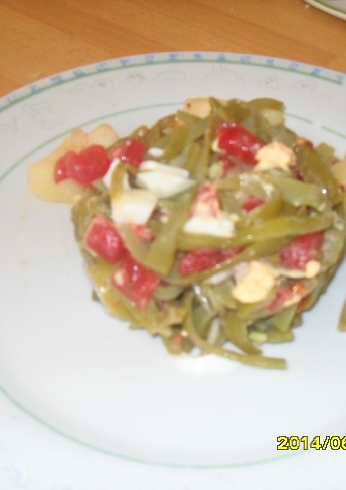 Una foto de Ensalada de judías, tomate y huevo