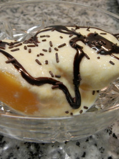 Una foto de Postre de melocotón en almíbar
