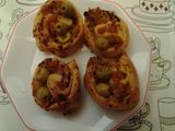 Mini pizzas de hojaldre con aceitunas