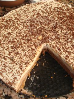 Una foto de Tarta tres chocolates casera