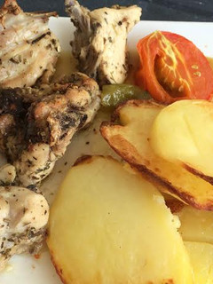 Una foto de Pollo al horno con hiebas aromáticas