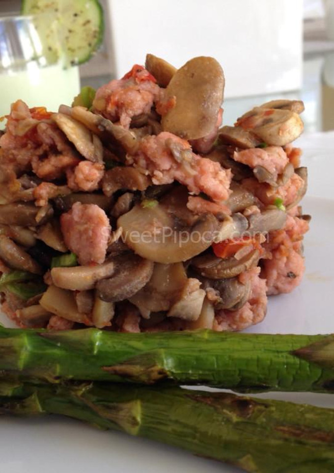 Una foto de Timbal de Champiñones