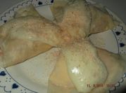 Una foto de queso rallado 4 quesos