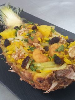 Una foto de Barquita con Arroz Frito con Piña