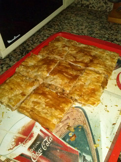Una foto de Empanada gallega de atún, pimiento, cebolla y huevo