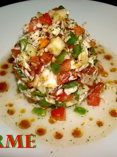 Una foto de Ceviche de merluza al vapor