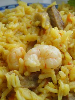 Una foto de Arroz con secreto y gambas