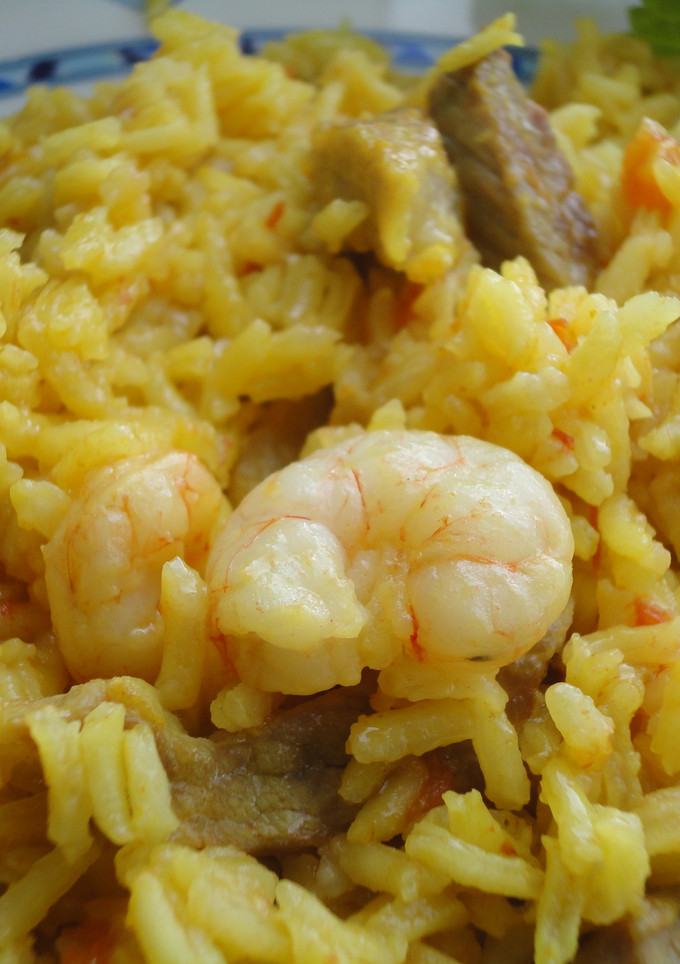 Una foto de Arroz con secreto y gambas