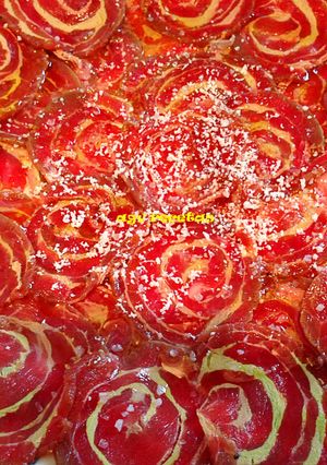 Una foto de Carpaccio de ternera con foie y mango