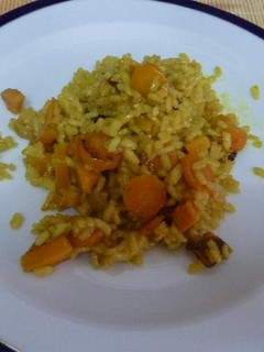 Una foto de Arroz naranja con calabaza, zanahorias y batata