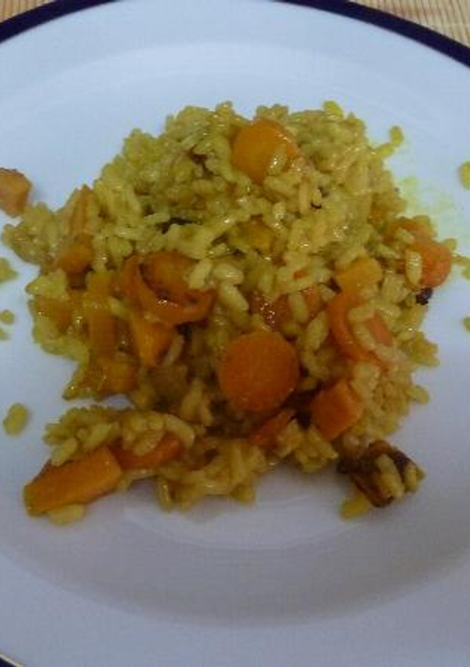 Una foto de Arroz naranja con calabaza, zanahorias y batata