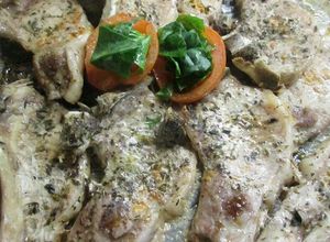 Foto principal de Costeletas de cerdo con zumo de tomate