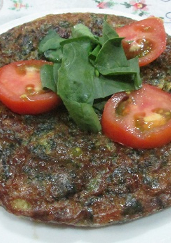 Una foto de Tortilla de brotes de espinacas salteados
