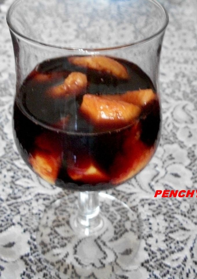 Una foto de Melocotones en vino de papá