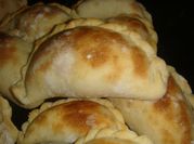 Una foto de tapa de empanada